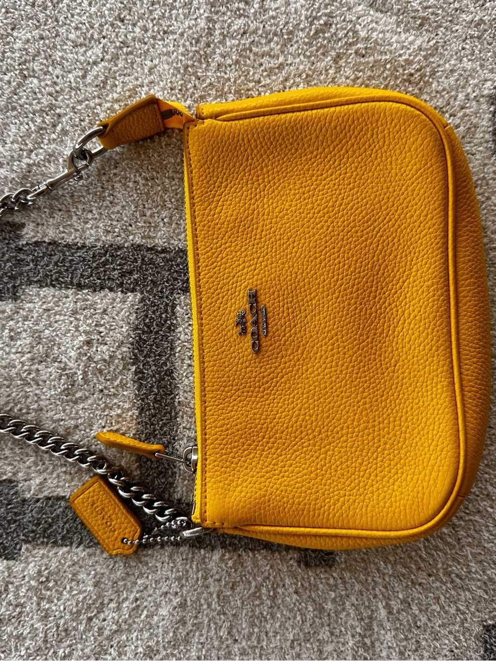 Coach wristlet in yellow